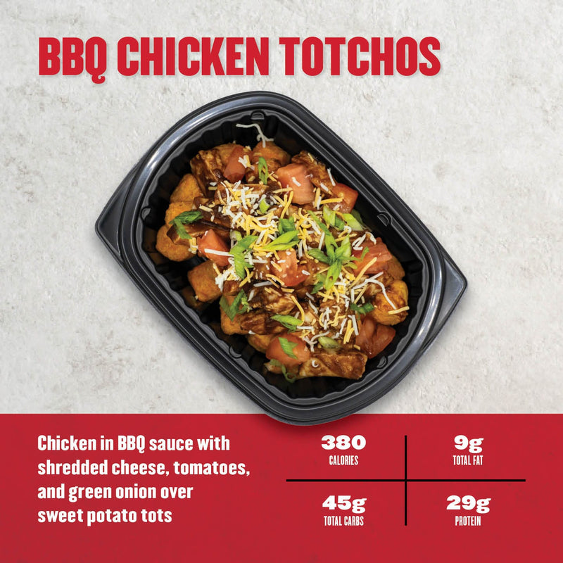 BBQ chicken with shredded cheese, tomatoes, and green onion over sweet potato tots. A flavorful high-protein meal.