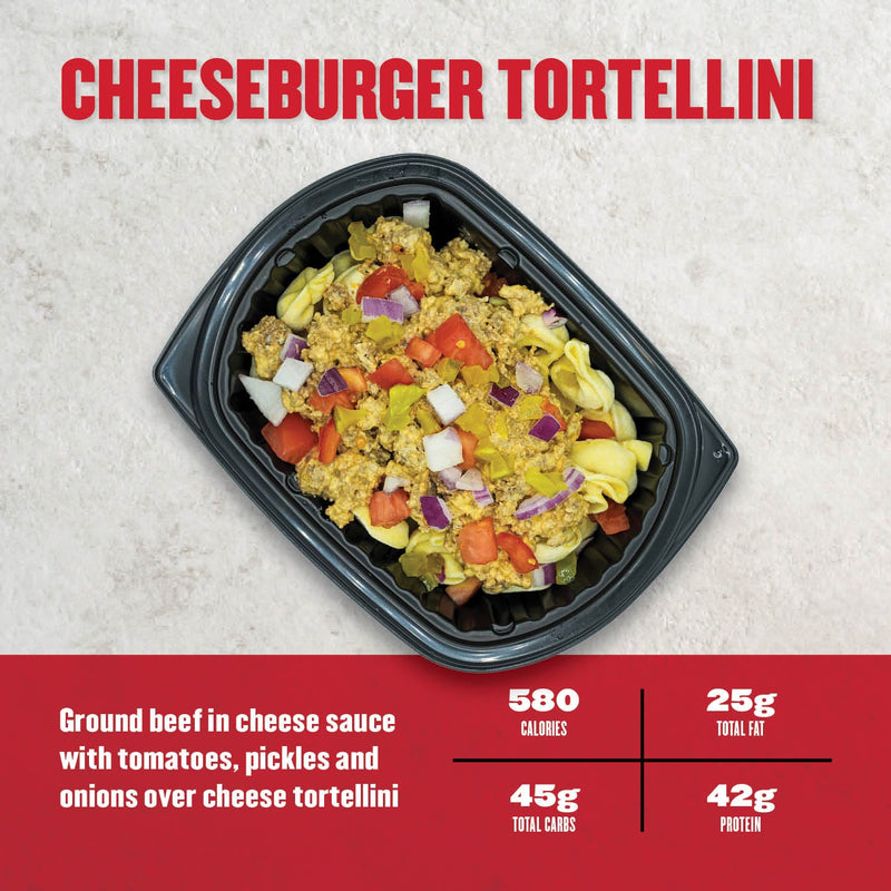 Clean Eatz Kitchen Cheeseburger Tortellini with seasoned ground beef, cheese sauce, tomatoes, pickles, and onions over cheese tortellini. High-protein meal