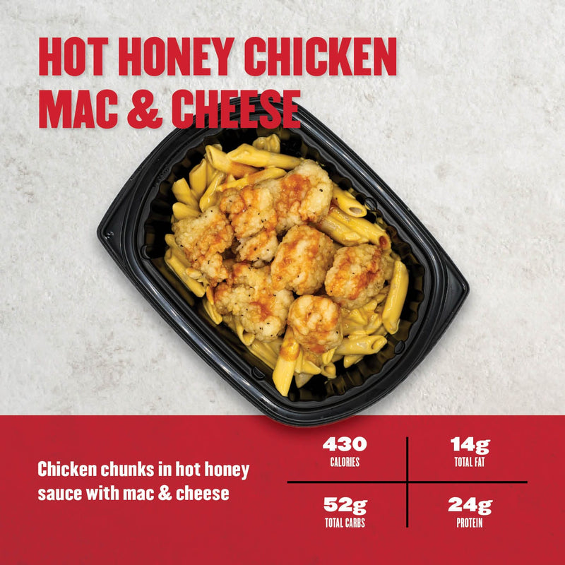 Clean Eatz Kitchen Hot Honey Chicken Mac & Cheese with crispy chicken chunks tossed in hot honey sauce over creamy mac & cheese. Sweet, spicy, and satisfying