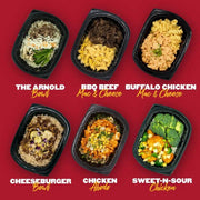 Clean Eatz Kitchen signature meals including The Arnold Bowl, BBQ Beef Mac & Cheese, Buffalo Chicken Mac & Cheese, Cheeseburger Bowl, Chicken Adobo, and Sweet-N-Sour Chicken. Delicious, calorie-conscious meals for healthy lifestyles.