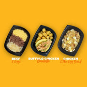 A variety of breakfast meal options from Clean Eatz Kitchen including Beef & Eggs with shredded beef, eggs, and hashbrowns; Buffalo Chicken Omelette with creamy buffalo chicken and tater tots; and Chicken & The Egg Bowl featuring diced chicken, scrambled eggs, and cheese. High-protein, calorie-conscious breakfast options for meal delivery.