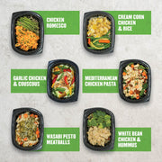 Mediterranean-inspired meals from Clean Eatz Kitchen, including chicken romesco, garlic chicken with couscous, Mediterranean chicken pasta, and white bean chicken with hummus, arranged in black meal containers.