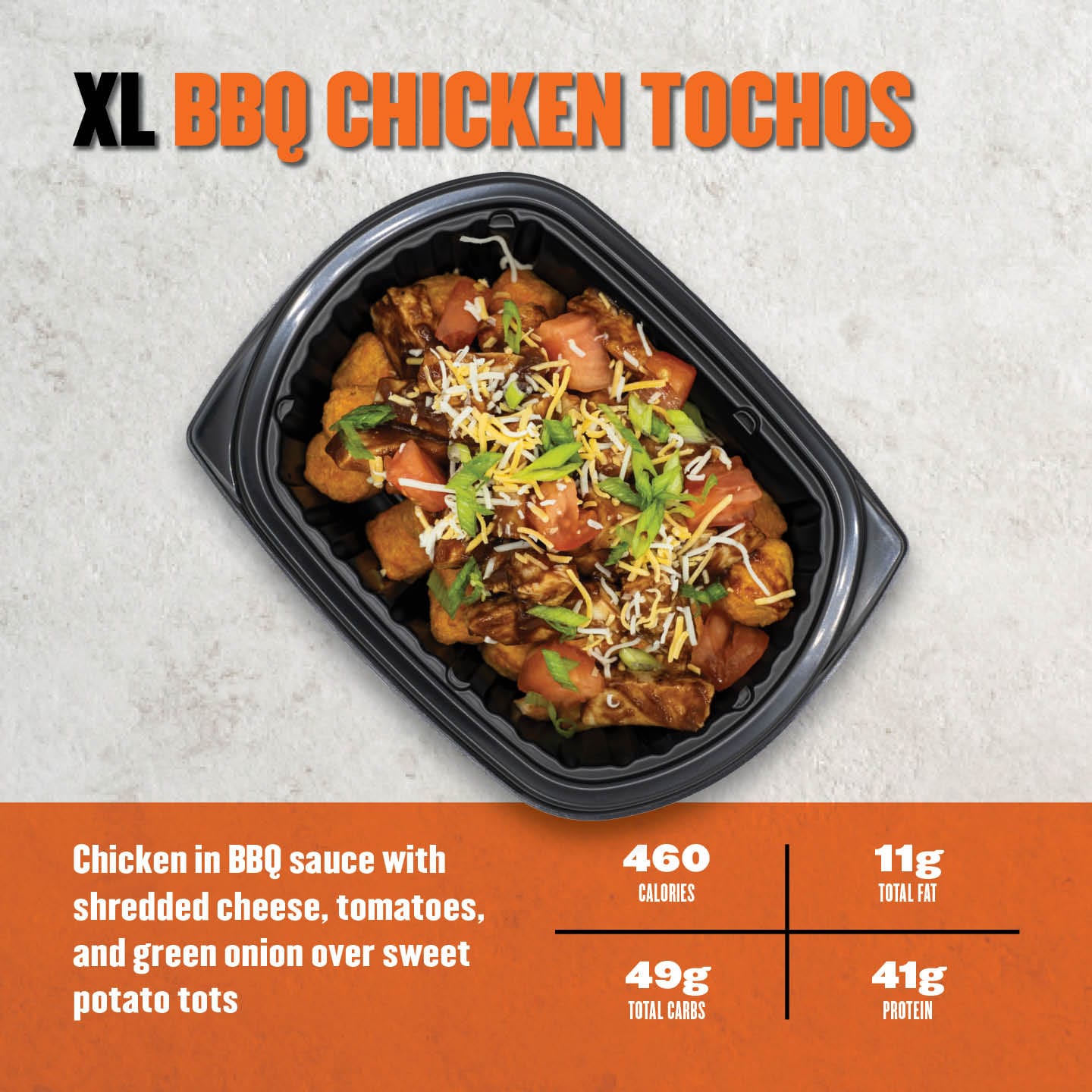 Clean Eatz Kitchen XL BBQ Chicken Tochos with chicken in BBQ sauce, shredded cheese, tomatoes, and green onions over sweet potato tots. A smoky, protein-packed meal.